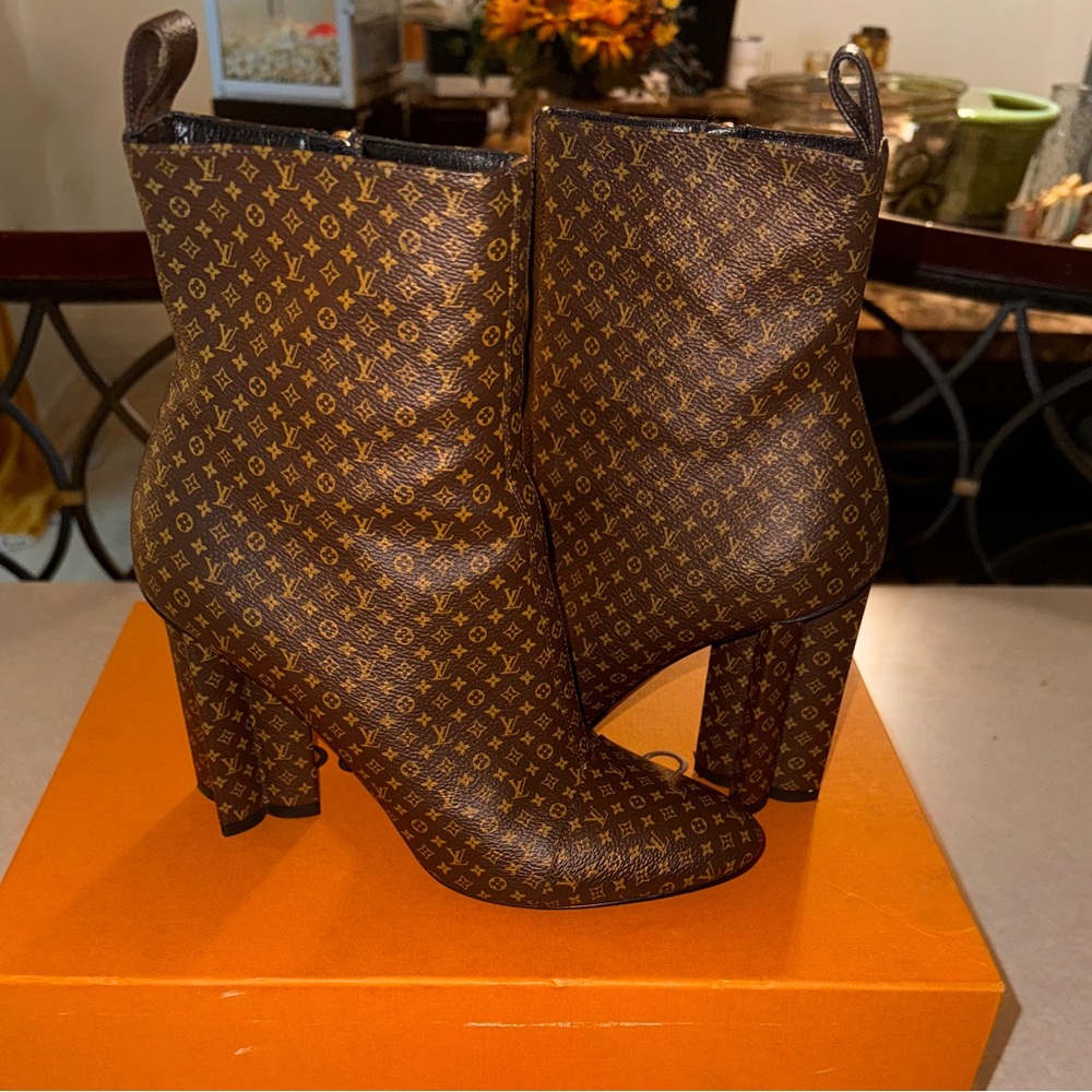 Louis Vuitton Monogram Heeled Boots in Brown
